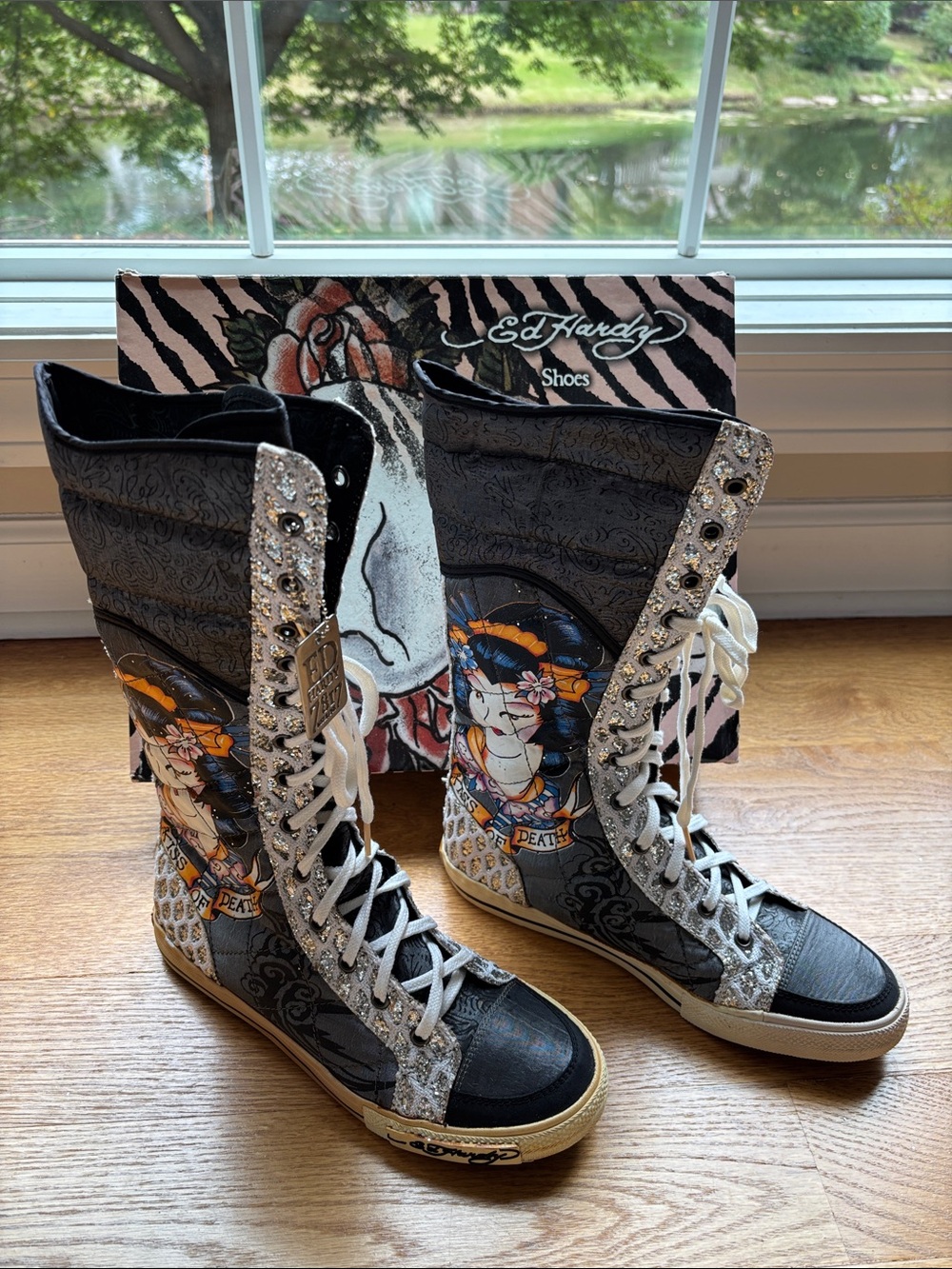 Ed Hardy Black Graphic Lace-Up Knee-High Boots with White Laces and Stud Accents